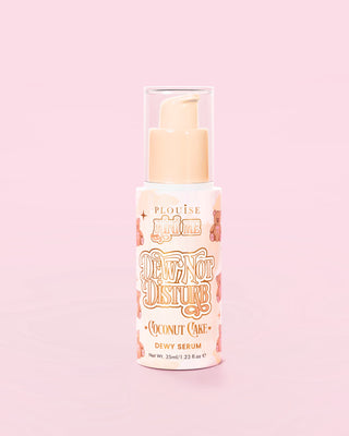 Bottle of P.Louise Dew Not Disturb Dewy Serum in coconut cake with a teddy design against a pink background