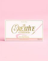 Die Vorderseite einer geschlossenen P.Louise Creative COMeback XXXL Rainbow Eyeshadow Palette mit goldener Typografie auf einem rosa Gehäuse vor einem rosa Hintergrund