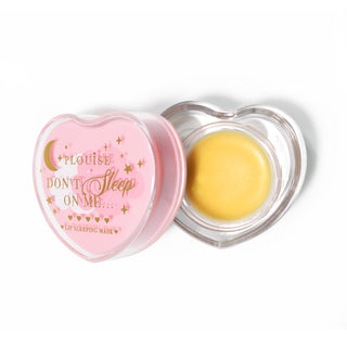 Pink heart-shaped lip sleeping mask with the lid off on a white background