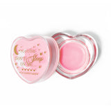 Rosa herzförmige Lippenschlafmaske mit abgenommenem Deckel auf weißem Hintergrund