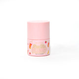 Rosa Flasche P.Louise Pass The Plump Lip Treatment auf weißem Hintergrund